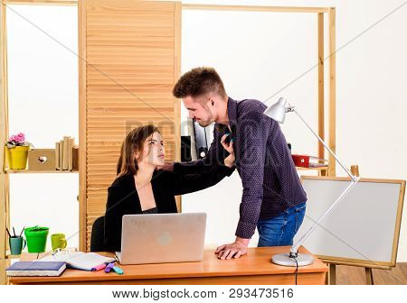 A Thirst For Romance. Couple Of Young Coworkers Conducting Office Romance. Workplace Romance Of Hand