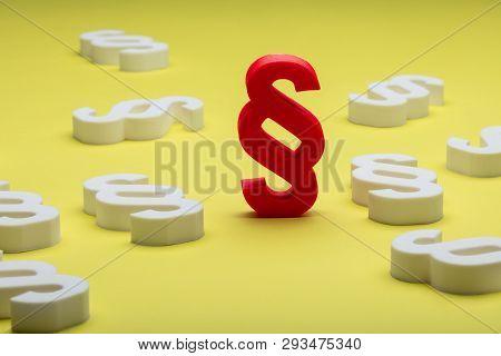 Red Paragraph Sign Surrounded With White Paragraph Sign On Yellow Background