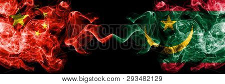 China Vs Mauritania, Mauritanian Smoke Flags Placed Side By Side. Thick Colored Silky Smoke Flags Of