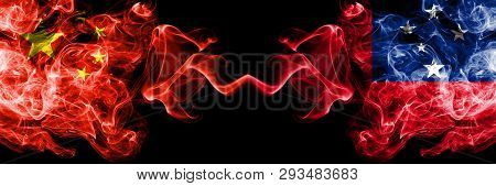 China Vs Samoa, Samoan Smoke Flags Placed Side By Side. Thick Colored Silky Smoke Flags Of Chinese A