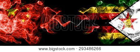 China Vs Zimbabwe, Zimbabwean Smoke Flags Placed Side By Side. Thick Colored Silky Smoke Flags Of Ch
