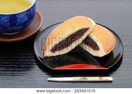 Japanese Confectionery, Dorayaki With Anko Paste On Wooden Plate