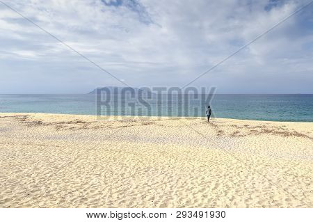 Beautiful White Sand Beach On Inakahama Yakushima Japan With A Man Stand Alone