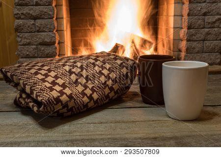 Mugs Of Hot Tea, Wol Scarf Near Cozy Fireplace, In Country House, Winter Vacation.