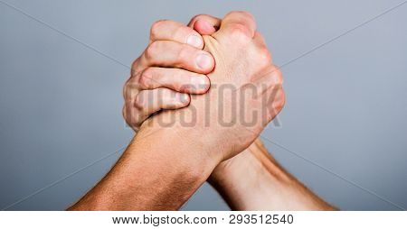 Friendly Handshake, Friends Greeting, Teamwork, Friendship. Handshake, Arms, Friendship. Hand, Rival