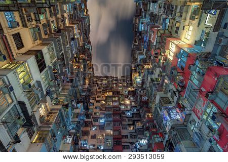 Yick Fat Building, Quarry Bay, Hong Kong. Residential Area In Old Apartment. High-rise Building, Sky