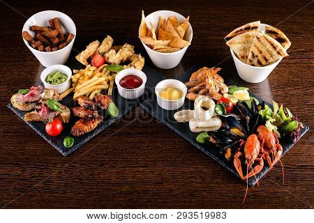 Set Of Seafood: Red And Black Caviar, Limb Of Hairy Crab, Seafood Platter. Mediterranean Cuisine Res