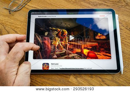 Paris, France - Mar 27, 2019: Pov Personal Perspective On Apple Arcade Webpage Seen On Modern Ipad P