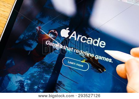Paris, France - Mar 27, 2019: New Apple Arcade Logotype Seen On Modern Ipad Pro Tablet Featuring The