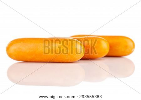 Group Of Three Whole Orange Sweet Licorice Comfit Isolated On White Background