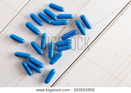 Lot Of Whole Blue Sweet Licorice Comfit Flatlay On White Wood