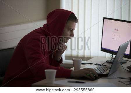 Belarus, Gimel, March 2, 2019. Business Center. Hackathon City. Teen In The Hood At The Computer