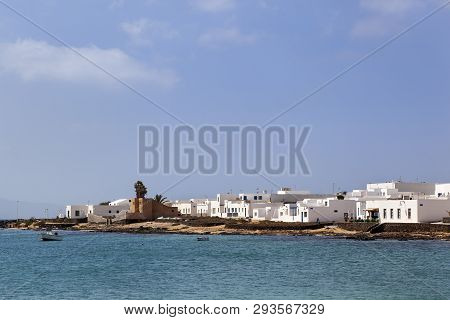 Sand And White Houses At The Coast Of Caleta De Sebo On The Island La Graciosa Of Lanzarote