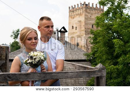 Happy Bride And Groom Walking On Gren Golf Course Outdoors, Copy Space. Wedding Couple In Love, Newl