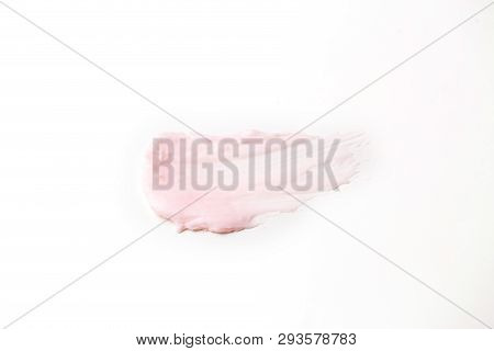 Pink Cosmetic Product Sample Isolated On White Background. Smear Of Moisturizing Face Cream, Body Lo