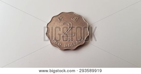 Two Hong Kong Dollars Coin Isolated On White Table