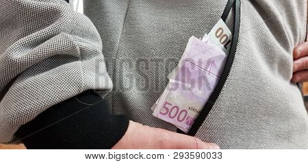 Five Hundred Euro Bill Stacked In A Pocket Of Gray Male Coat