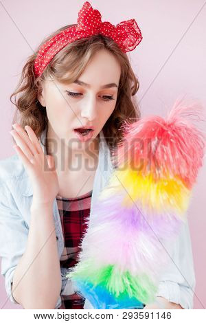 Cleaning Pin Up Woman. Smiling Pinup Girl Holds Colorful Duster Brush. Cleaning Service. Pin-up Girl