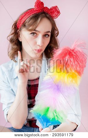 Cleaning Pin Up Woman. Smiling Pinup Girl Holds Colorful Duster Brush. Cleaning Service. Pin-up Girl