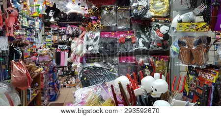 Rishon Lezion, Israel - March 5 2019: White Sculls Devil Stics Masks Fancy Dresses And Other Plastic