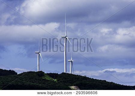 Yhe Wind Mill Tower On The Hill