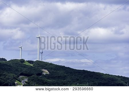 Yhe Wind Mill Tower On The Hill