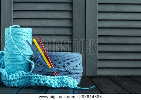 Babins With Blue And Blue Yarn For Making Handmade Knitted Bags. Selective Soft Focus. Free Space Fo