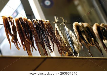 Octopus And Fish Put To Dry In A Restaurant In Aliki, A Fishing Village In Paros In The Cyclades, Gr