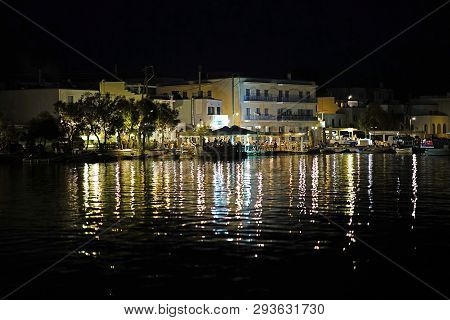 Paros, Greece, 15 September 2018 Night View Of The Port Area Of Aliki, A Fishing Village In Paros Wi