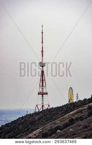 Tv Tower And Ferris Wheel