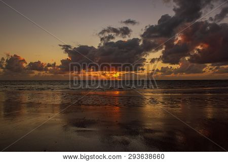 Colorfull Sunrise Over The Coral Sea At Cape Tributation In The Daintree Region Of Far North Queensl