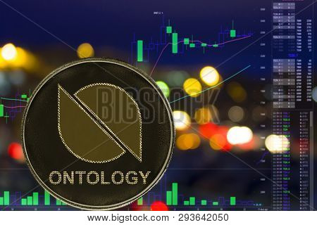 Coin Cryptocurrency Ont Ontology On Night City Background And Chart.