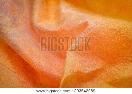 background of orange and red marbled momi paper
