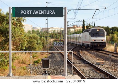 Port Aventura, Spain - August 1, 2016. Port Aventura Railway Station. Approaching Train. City Of Sal