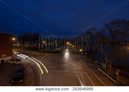 Laval, Canada - November 9, 2018: Residential Street At A Crossroad In A Suburban Street, Typical Fr