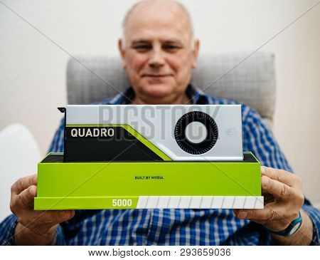 Paris, France - Mar 28 2019: Smiling Senior Man Showing Demonstrating Latest Nvidia Quadro Rtx 5000 