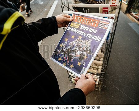 Paris, France - 29 Mar 2019: Newspaper Stand Kiosk Selling Press With Senior Male Hand Buying Latest