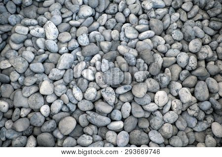 Texture Of White Stone For Interior On Iron Basket Background. Circle White Stome Made By Water Fall