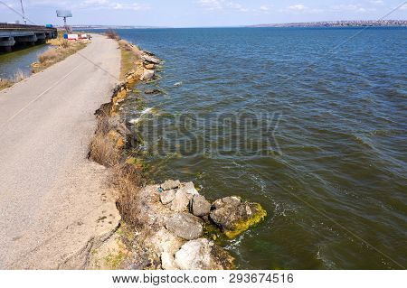 After An Earthquake And Strong Storm In Winter And Severe Destructive Frost, Asphalt Road On Landsli