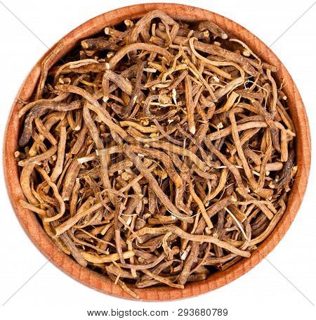 Valerian Root Wooden Bow Isolated On White.