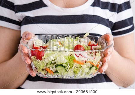Woman Hands Holding Vegan Vegetable Salad