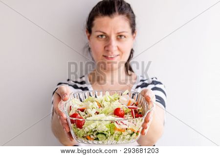 Woman Hands Holding Vegan Vegetable Salad