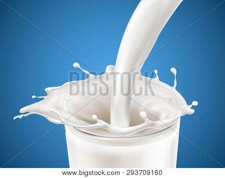 Milk Plashing Effect With Liquid Pouring Down In Glass Cup Isolated On Blue Background. Design Eleme