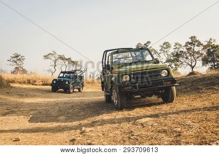 Safari Game Drive. The Safari Vehicles. Chase Car In The Fall On The Road. Cars Without A Roof.