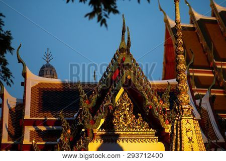 Bangkok, Thailand - April 6, 2018: Wat Pho Buddist Temple - Decorated In Gold And Bright Colors Wher