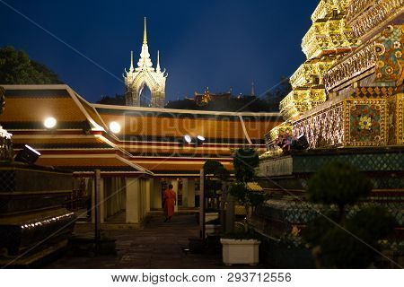 Bangkok, Thailand - April 6, 2018: Wat Pho Buddist Temple - Decorated In Gold And Bright Colors Wher