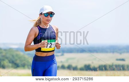Young Slim Woman Running Trail Race Contest