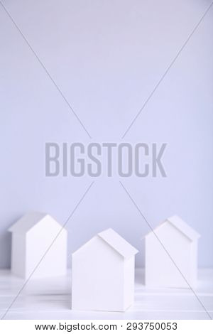 Paper Town. Papercraft House And Papercraft Building On Grey Background