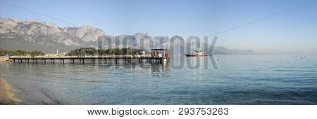 Kemer Antalia Nice View Of The Sea. Beach Kemer Antalia With Sand And Mountains, The Sea With The Sh