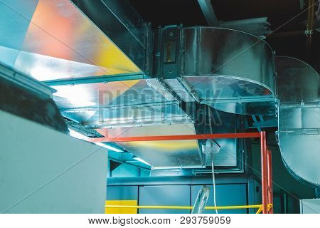 Close-up View Of The Modern Big Dimensions Ductwork Installed On The Ceiling Of The Ventilation Plan